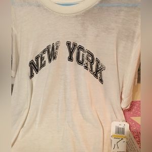 NWT white T-shirt with “New York” on it by Rebellious One - Juniors size M